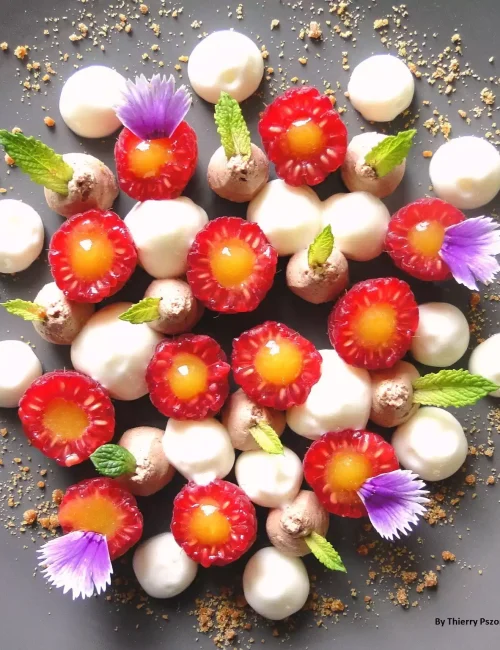 dessert contant des framboises, confectionnée par thierry pszonka